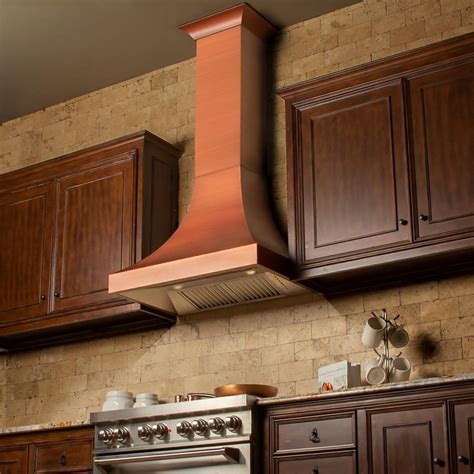Not only will your Premier Copper Products hood be the crowning jewel of your kitchen it is a true piece of functional art. Beautifully designed 100% hand crafted and as refined as your style. 36 Inch 1250 CFM Hammered Copper Wall Mounted Correa Range Hood with Screen Filters Features: Configuration: Hammered Copper with Steel Frame Construction